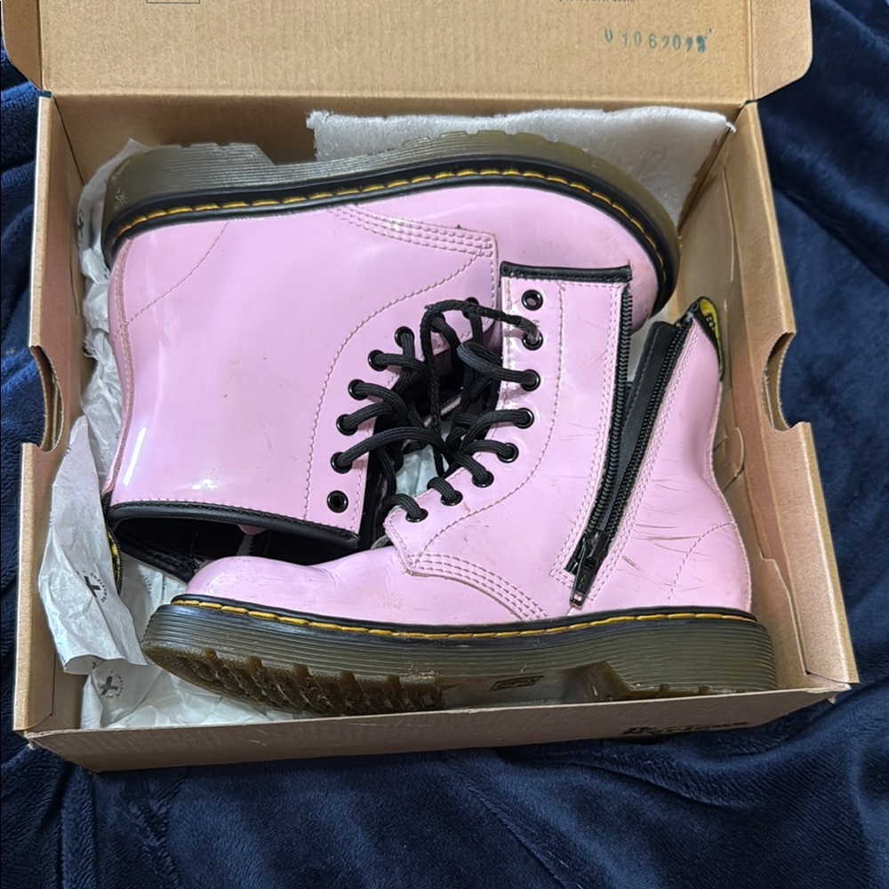 Dr. Martens Pink Combat Boots with Lace-Up Front and Thick Sole